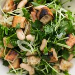 Pea shoot salad with radish and carrot